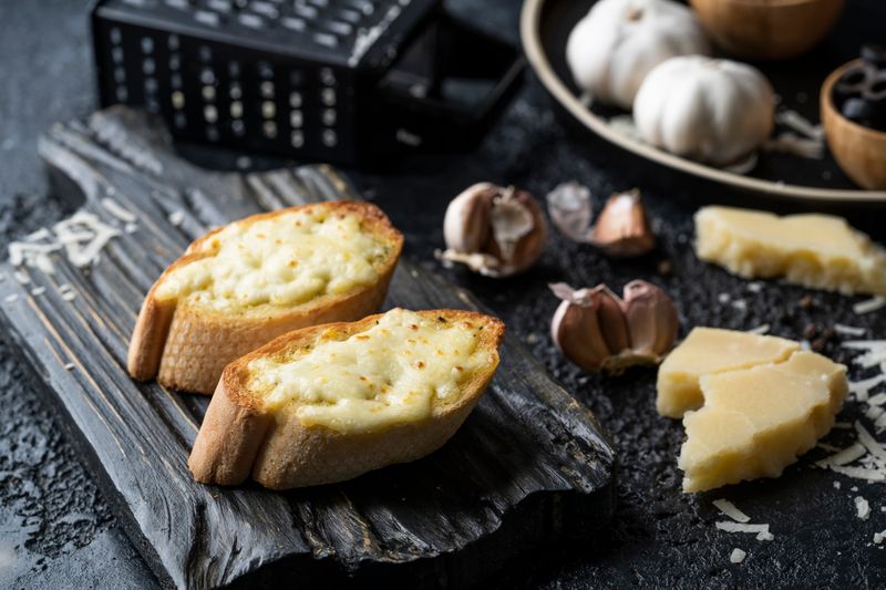 Garlic bread with herbs and cheese dip