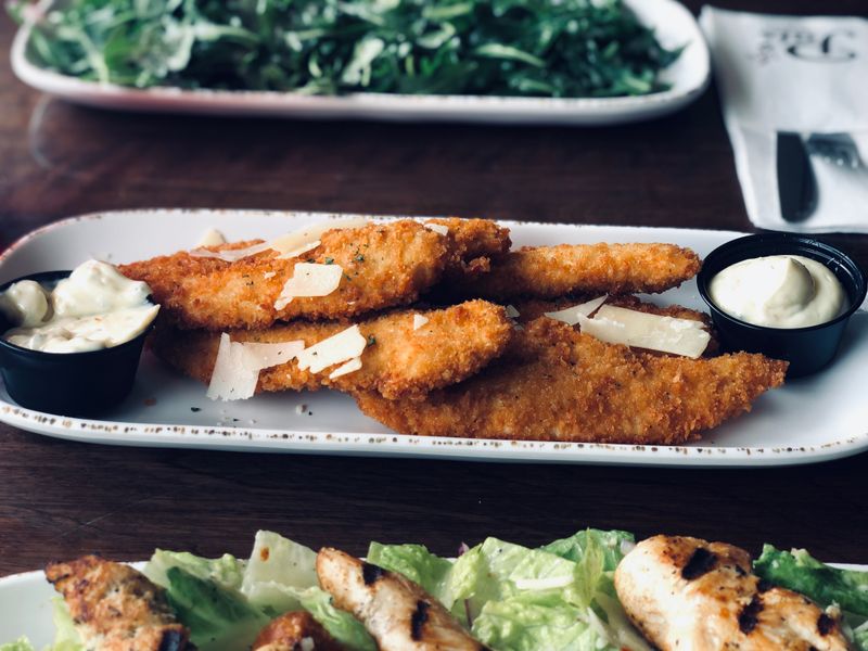 Crispy mozzarella sticks with marinara sauce